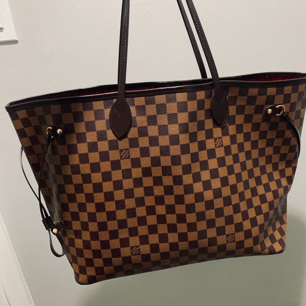 Louis Vuitton never full bag. (Extra big)